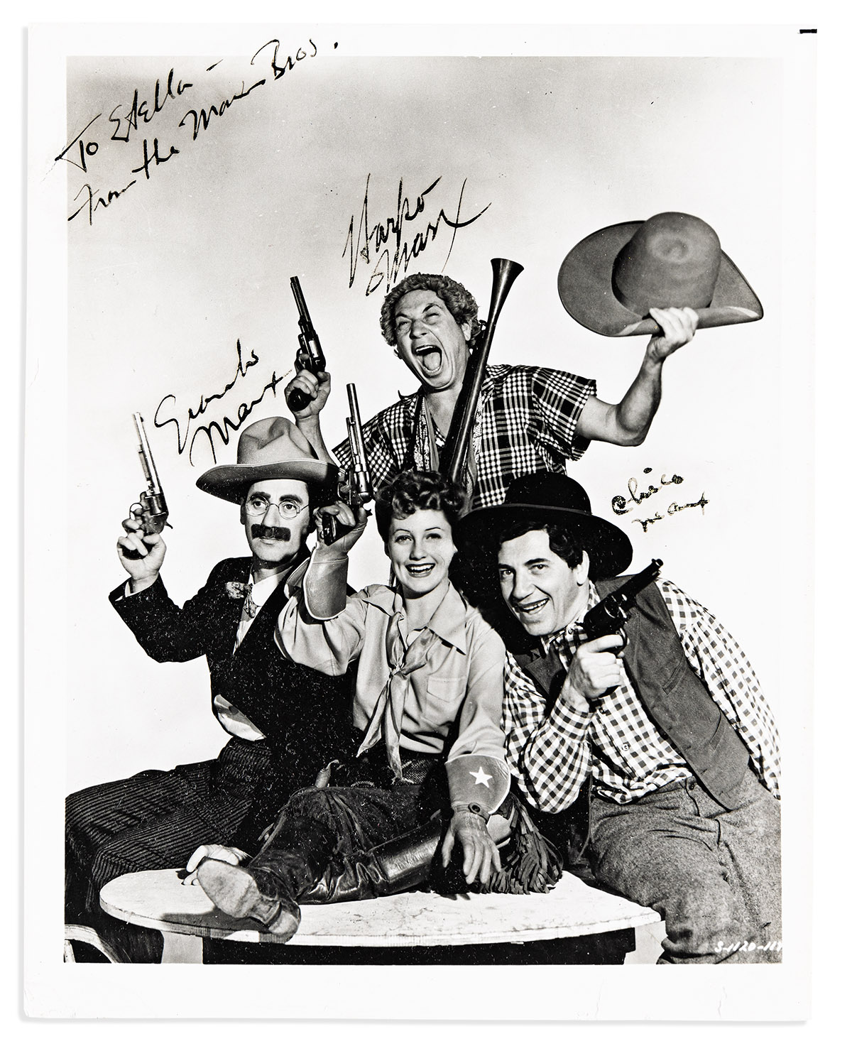 MARX BROTHERS. Photograph Signed, by Harpo, Groucho, and Chico, half-length group portrait showing them in costumes from Go West.